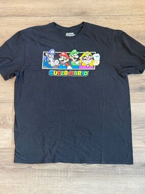 Nintendo Black Tee with Colorful Super Mario Character Panel